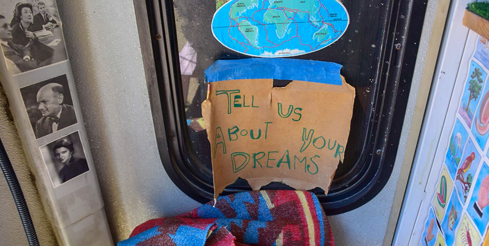 Tell Us About Your Dreams sign in the Dream Wanderer bus